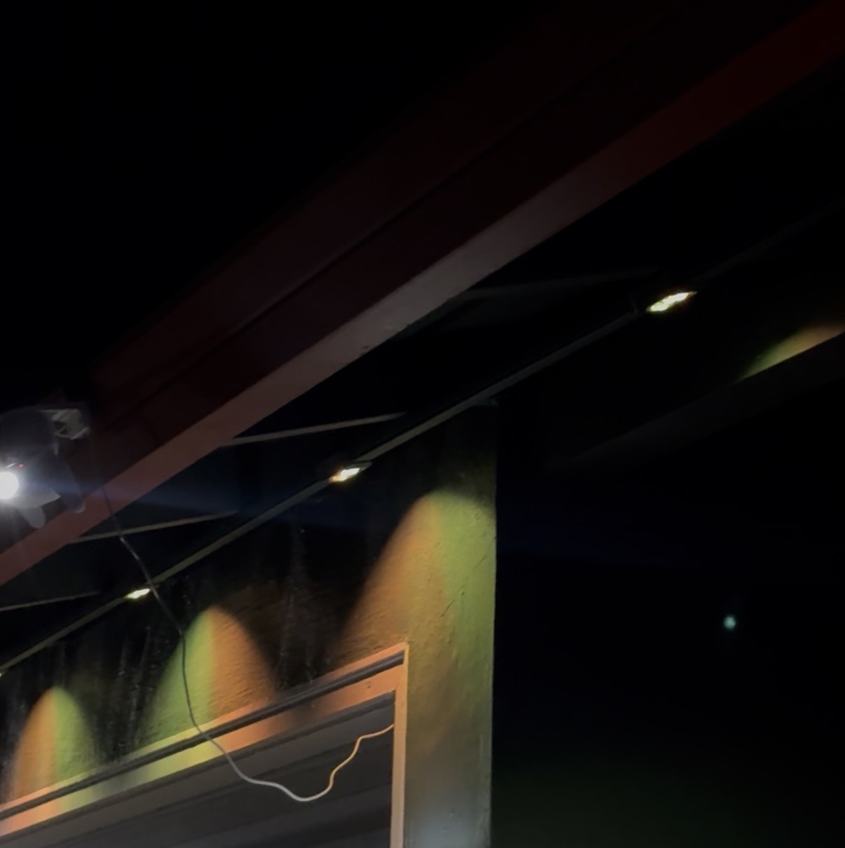 PermTrack installation with colorful lighting at night